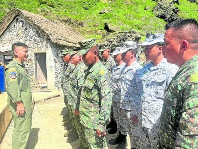 Filipino troops keep spirits high on ‘lonely island'