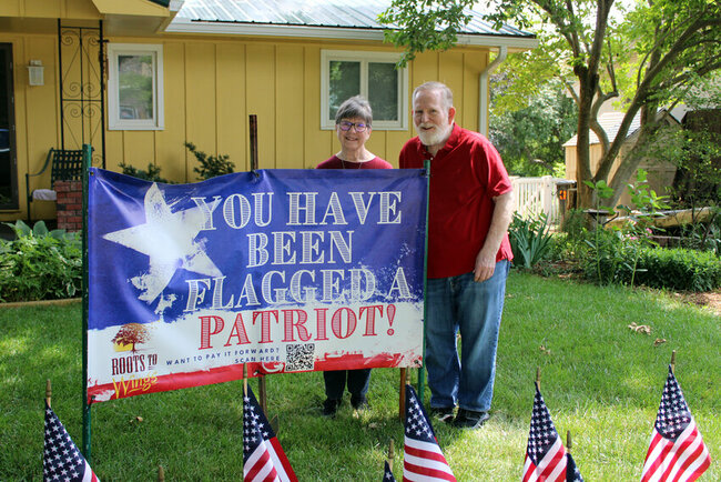 Roots to Wings holds 'flagging' fundraiser