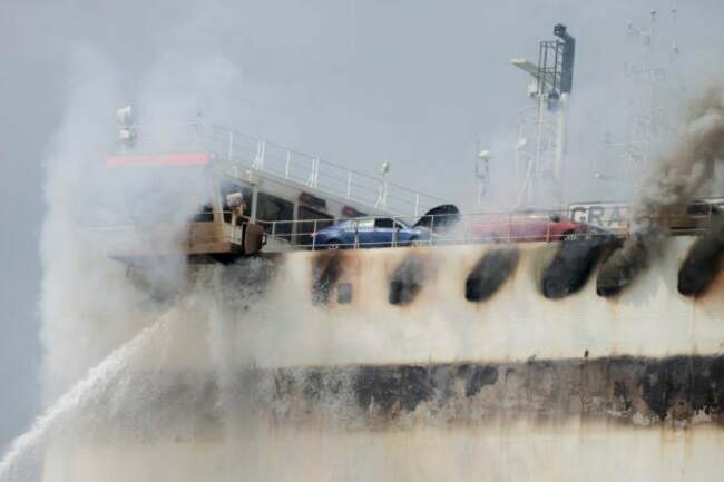 Fire that killed 2 aboard a cargo ship in New Jersey expected to burn for days