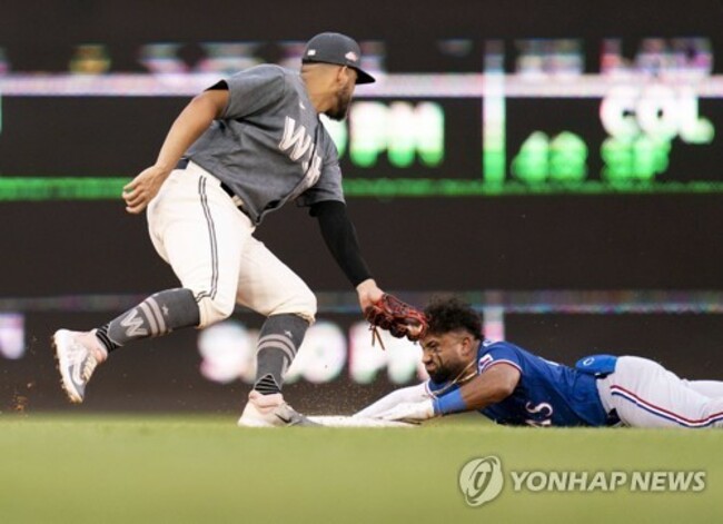 CORRECTION Rangers Nationals Baseball