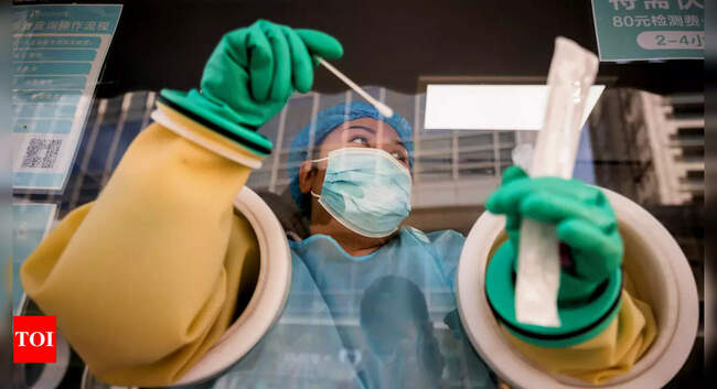 China's Covid-19 outbreak grows as cities race to trace infections
