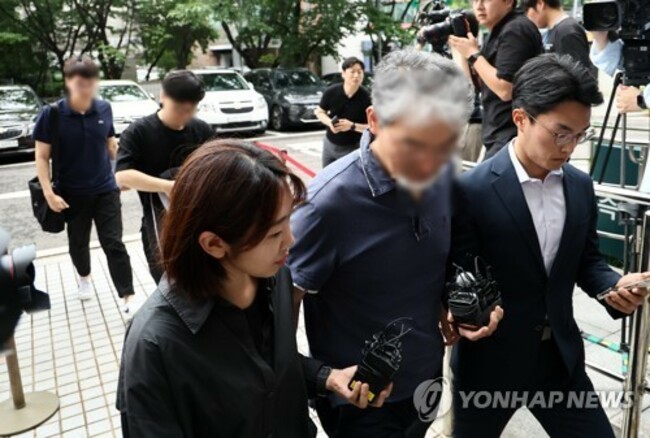 Operator of online trading community arrested on stock manipulation charges