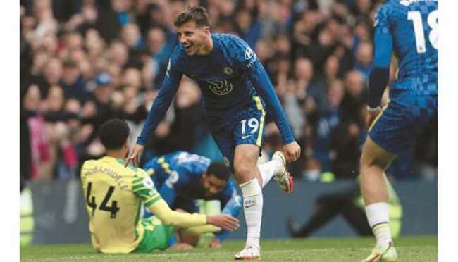 Chelsea hit Norwich for seven to stay top, Man City beat Brighton