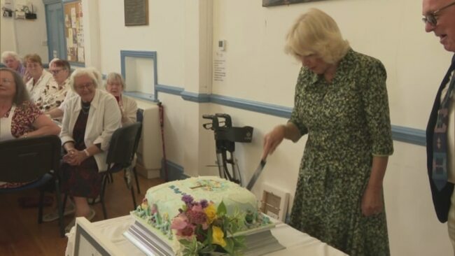 Queen receives three cheers during visit to Oasis Centre