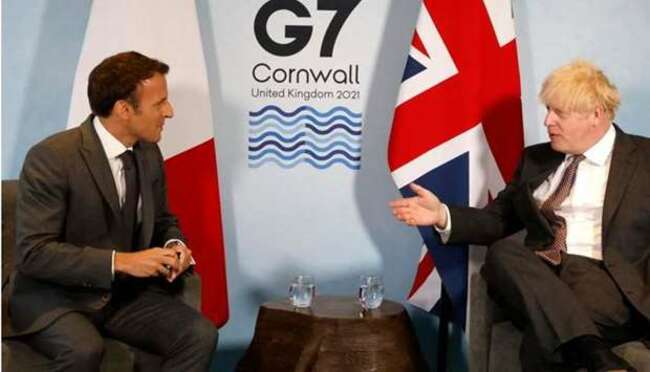 UK vows action if French carry out fishing row threats