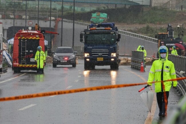 At least 51 dead or missing amid continued downpours