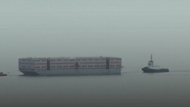 Bibby barge arrives in port after Government sees off challenge to asylum plans