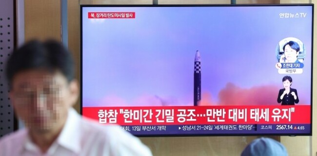 N.Korea fires two missiles as US sends nuclear submarine