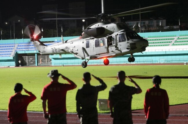 Marine swept away during search for missing rain victims found dead
