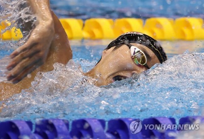 With one record set, swimmer Kim Woo-min driven to break more