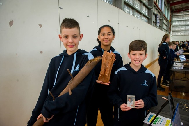 Students show off their archaeological finds