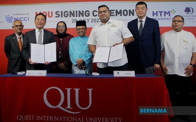 QIU SIGN MOU WITH HTM PHARMACY, DOUBLETREE BY HILTON DAMAI LAUT RESORT