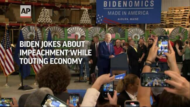 Biden jokes about impeachment while touting economy