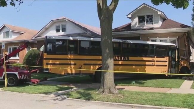 Bus crashes into parked car, utility pole and NW Side home