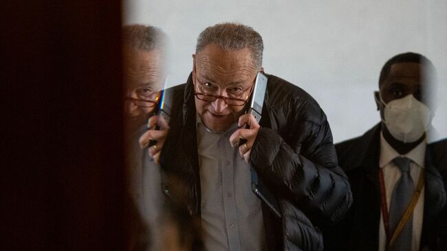 Schumer vows to "get something done" on Biden plan