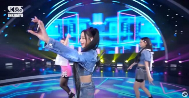 NewJeans draws regulator scrutiny after flashing iPhone while performing
