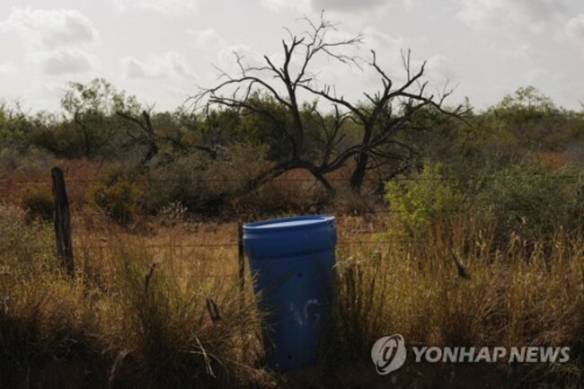 APTOPIX Immigration Missing Water Stations