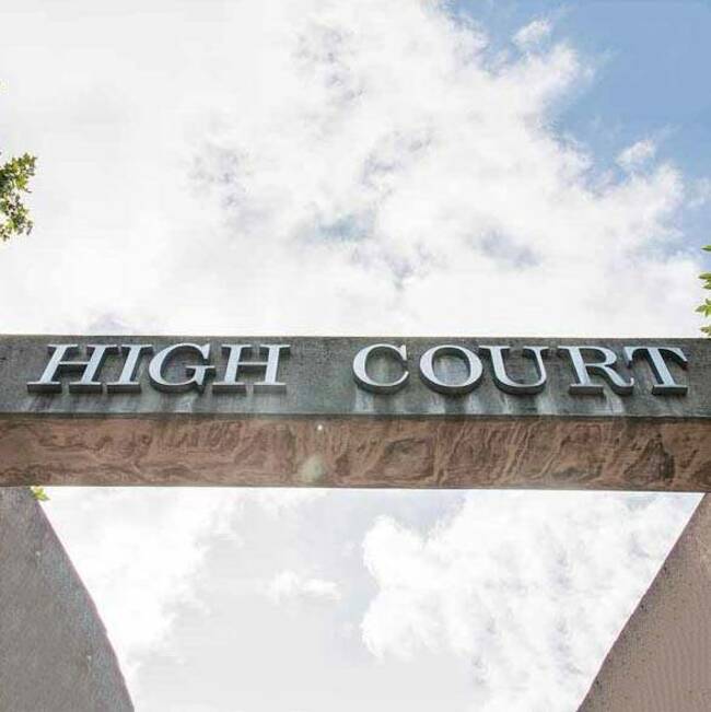 Former finance co directors win small damages against AG