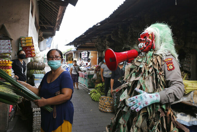 Two influencers ordered off Bali after fake mask video prank