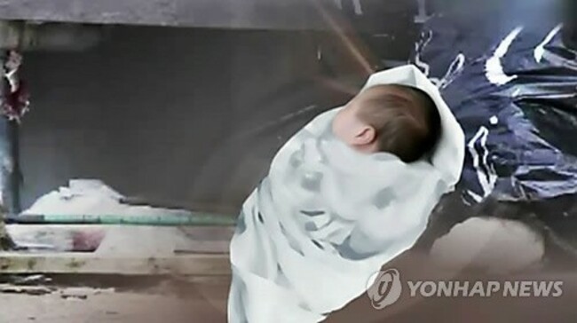 Mother arrested on charges of smothering newborn daughter to death
