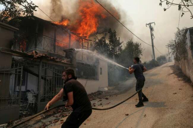 Wildfire outside Athens as hundreds of blazes ravage Greece