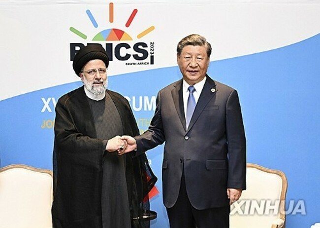 SOUTH AFRICA-JOHANNESBURG-XI JINPING-IRAN-PRESIDENT-MEETING