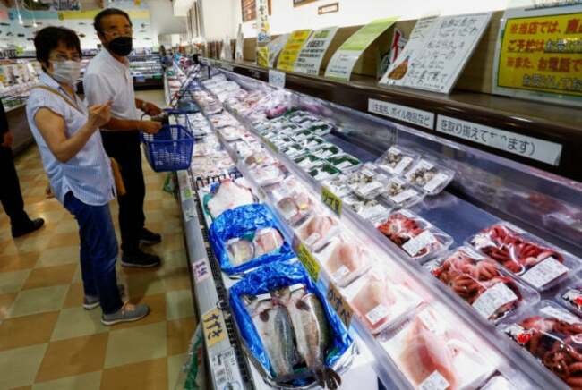 Japan downgrades Q2 GDP growth on soft capital spending