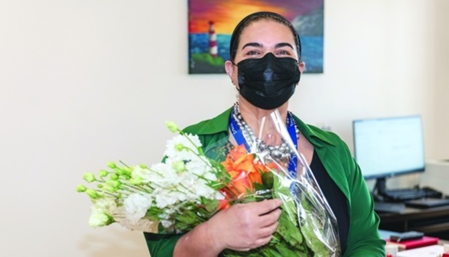 Doha College celebrates longest-serving member of staff