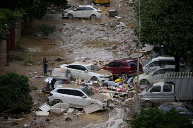 Rains from dying typhoon batter China for seventh day