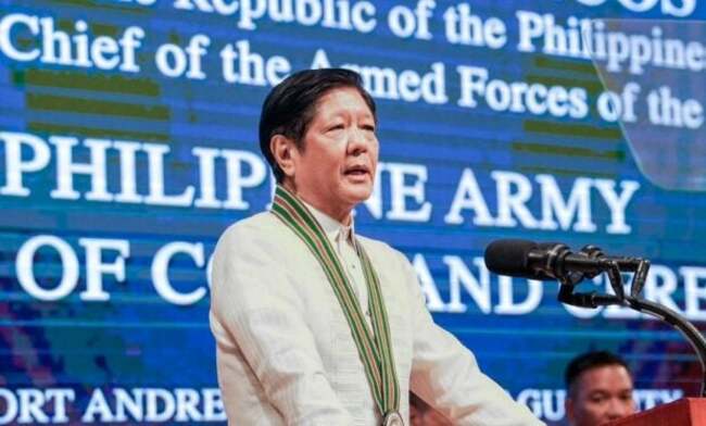 Marcos celebrates 66th birthday in Singapore for Asia summit