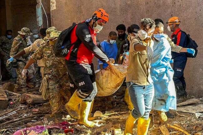 Searchers look for more than 10,000 missing in flooded Libyan city