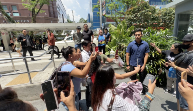 OFWs welcome Bongbong Marcos during surprise visit at mall in Singapore