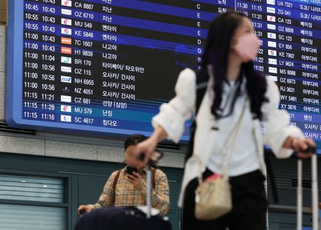Korea-China air travel takes off as group tourists return