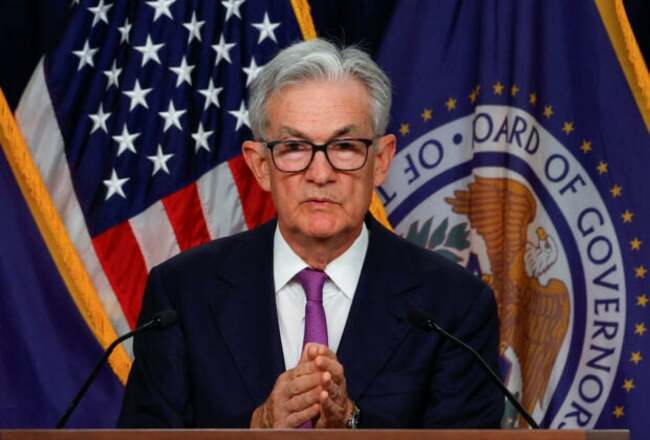 Fed keeps rates steady, toughens policy stance as ‘soft landing' hopes grow