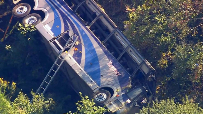 Two killed when bus carrying high schoolers crashes on way to band camp