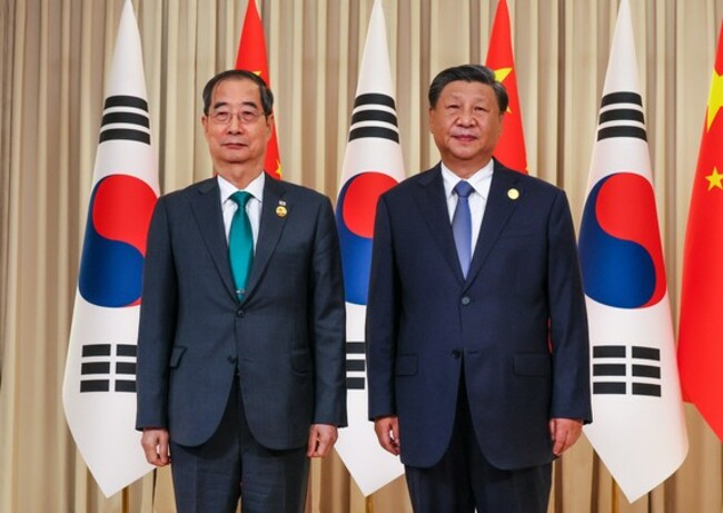 Xi 'seriously considering' state visit to Seoul