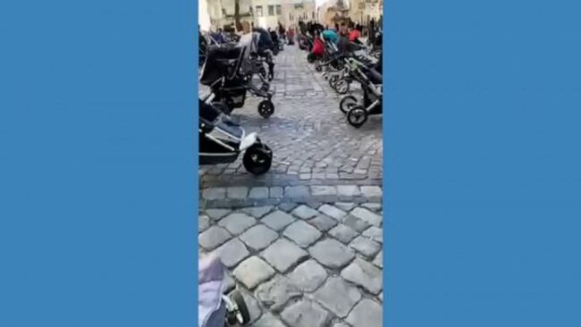 Video Baby carriages represent deaths of Ukrainian children in war