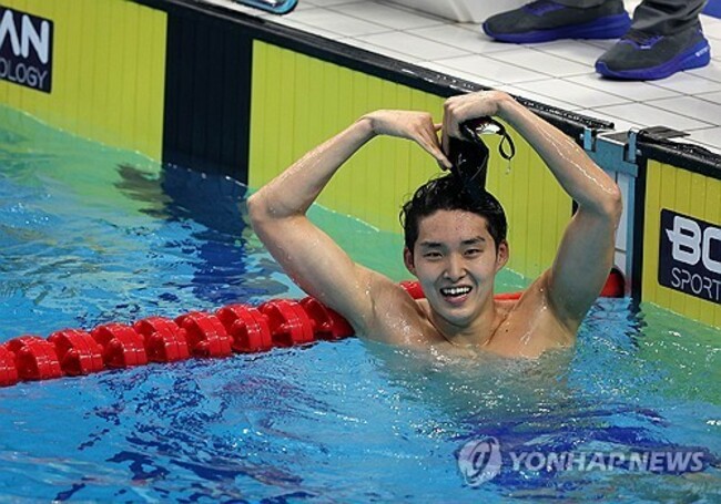 (Asiad) Swimmer Kim Woo-min captures 3rd gold in Hangzhou