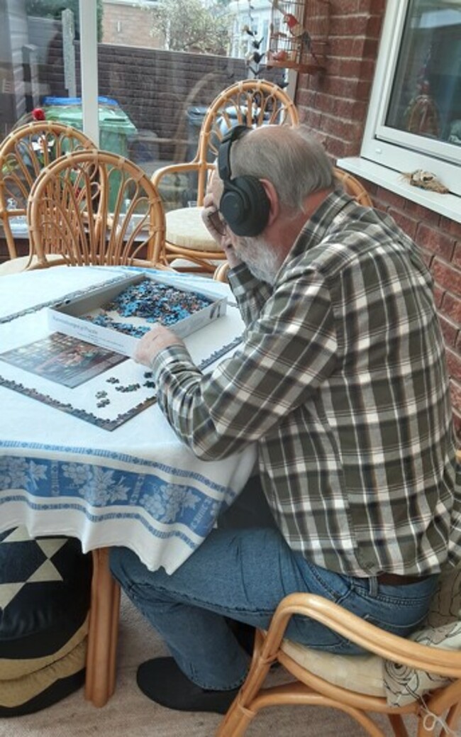 A peaceful corner to complete a new jigsaw puzzle on a rainy Saturday afternoon.