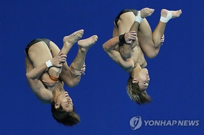 APTOPIX China Asian Games Diving