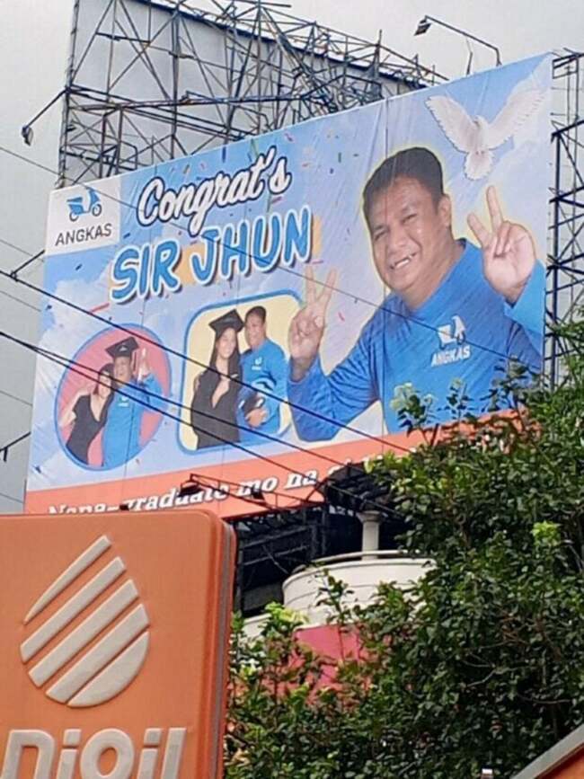 Angkas recognizes biker's achievements with larger-than-life billboard
