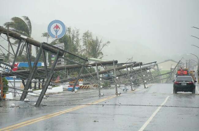 Typhoon Koinu turns south off China's coast, headed for Hainan