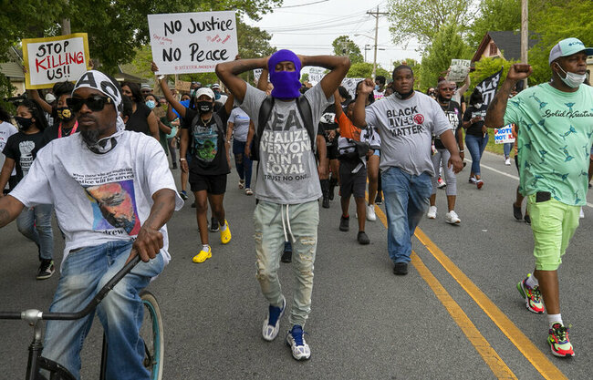Curfew made later after protests over shooting of Black man