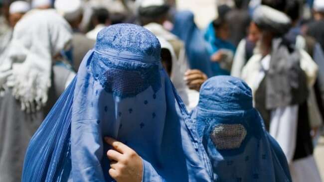 Afghanistan's Taliban order women to wear burqa in public