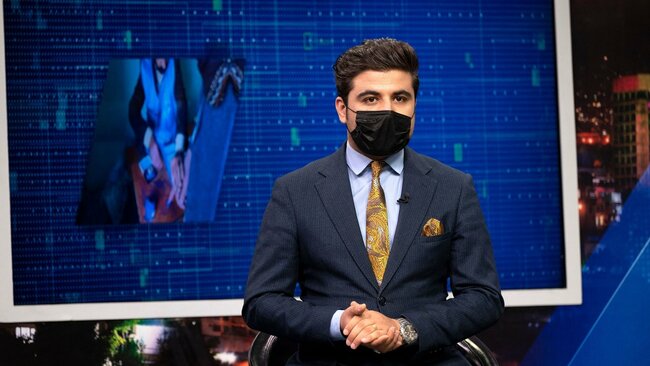 Afghan male TV presenters wear masks in protest