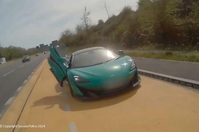 "Reckless" £185k McLaren driver speeds at 130mph past police vehicle in shocking dashcam footage