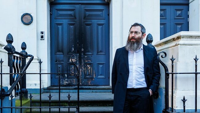 As an arsonist set fire to a synagogue, children played inside, metres from the flames
