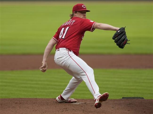 Reds beat Marlins 7-2, halt Miami&#39;s 11-game road winning streak