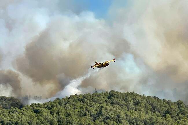 Deadly wildfires strike France as huge blaze continues to spread