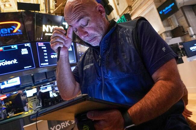 Wall Street holds steady following mixed profit reports from McDonald’s, Disney and Shopify